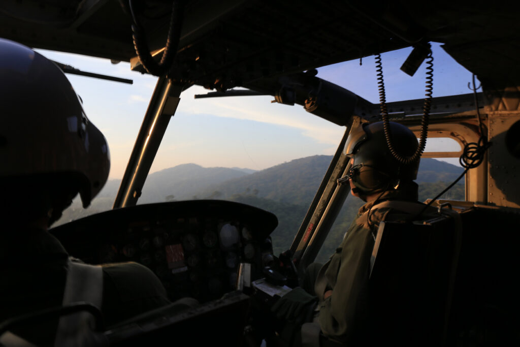 cockpit view helicopter pilot patrol flight near Thailand-Myanmar border
